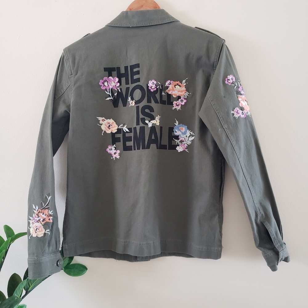SUKO JEANS Utility Cargo Embroidered Jacket - "The World Is Female" - Army Gr S